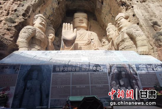 時下，中國“石窟鼻祖”天梯山石窟第13窟大佛足部與局部危巖體搶救性保護項目正在施工。圖為施工現(xiàn)場。陳曉斌 攝