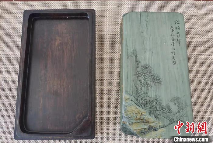 圖為盧保勝為提升洮硯文化內(nèi)涵，制作“一硯一銘、一盒一拓”成品展示。　張婧 攝